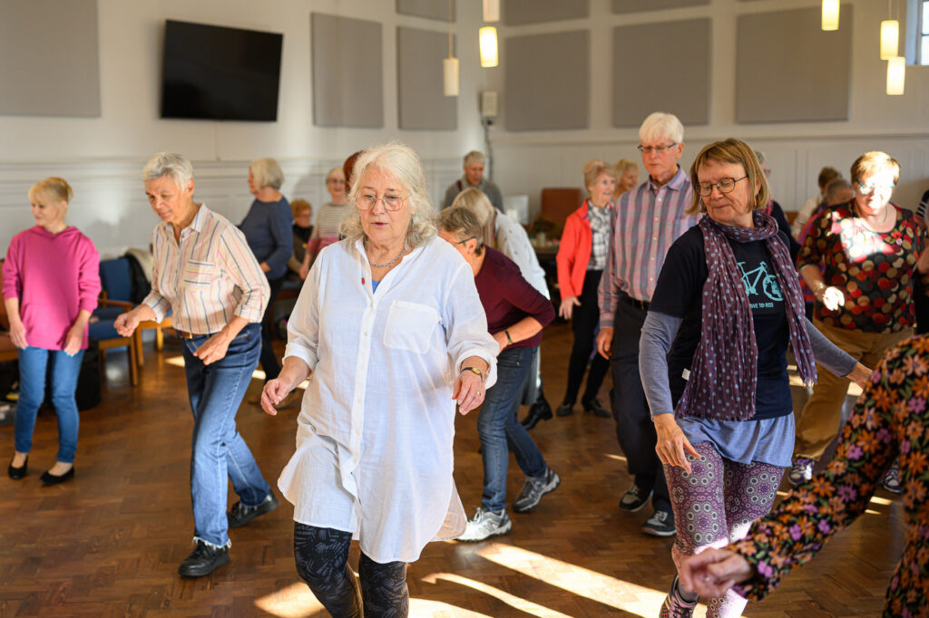 Dancing merengue; learning our dance for the flashmob.