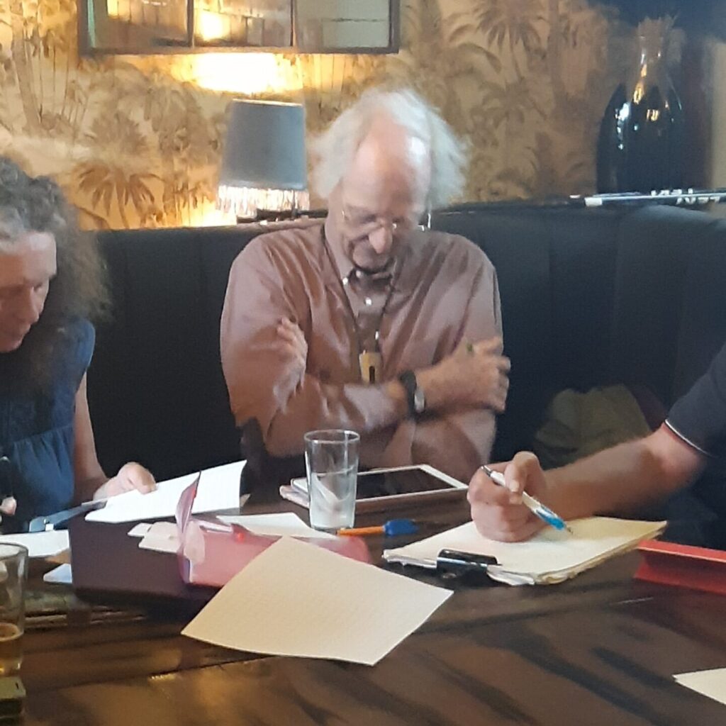 Three members of Mathematics, working together, studying a problem.