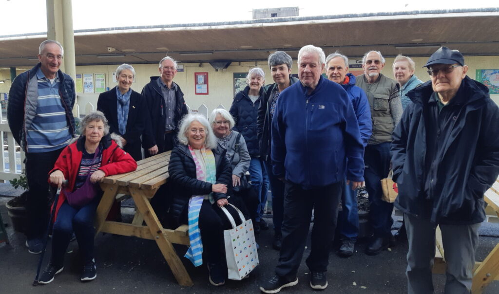 A group of members visiting Carnforth Station for the Brief Encounter Experience.