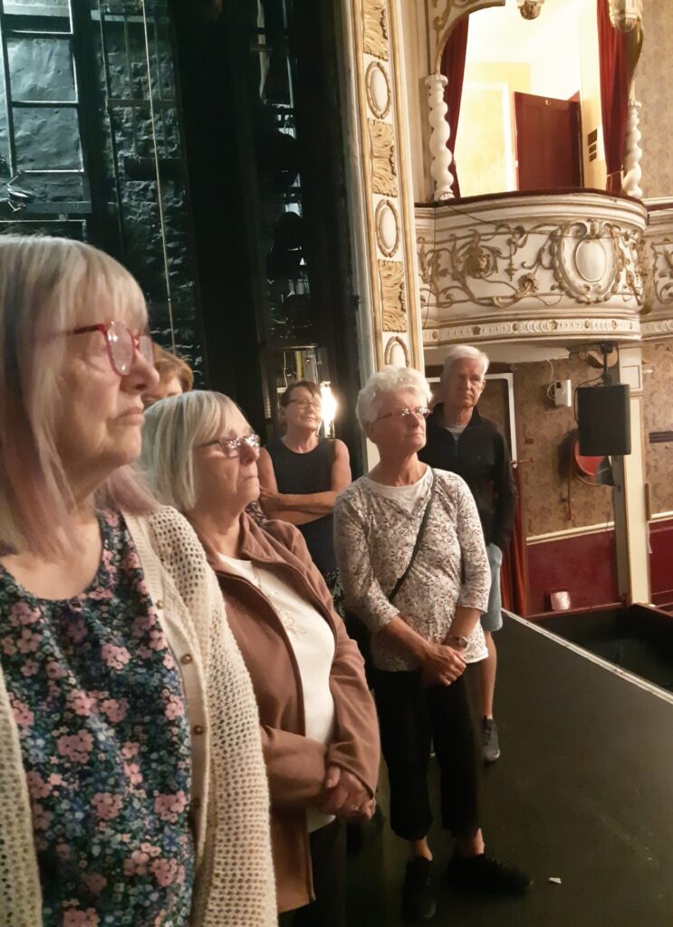 Standing on the stage looking out