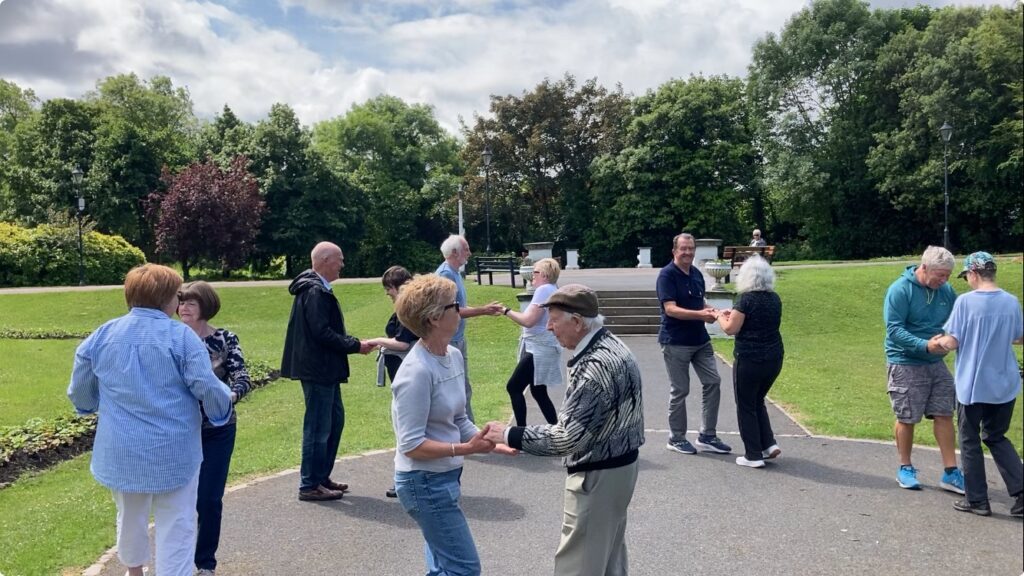 Dancing in pairs in the park