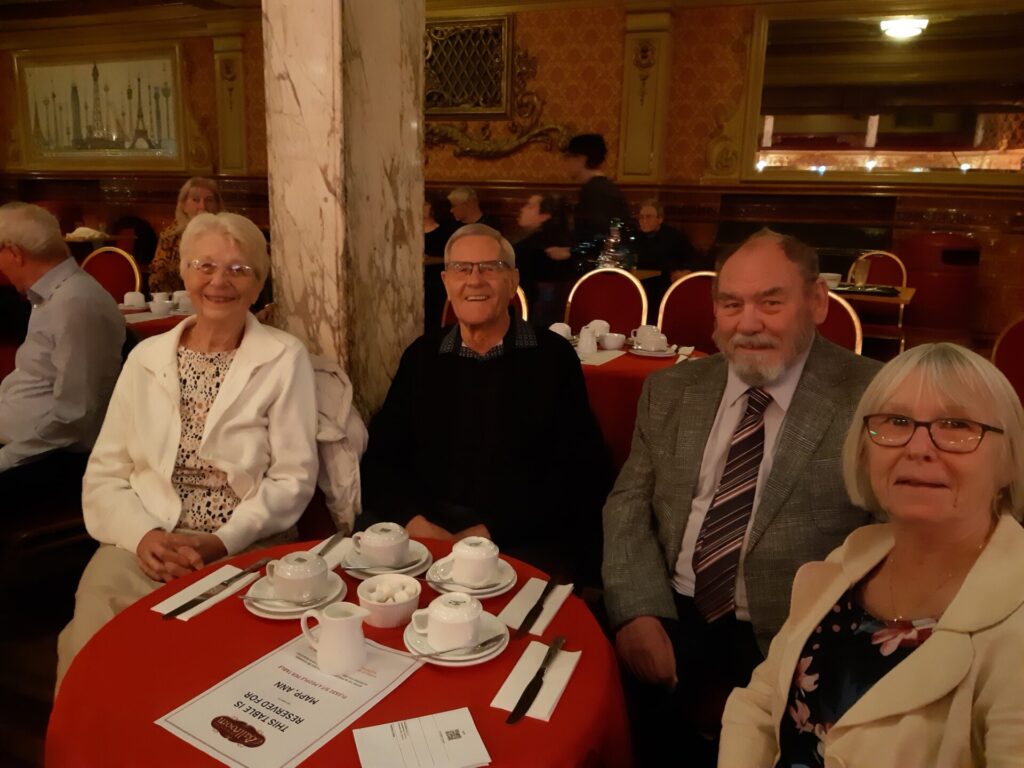 Members sitting at the table.