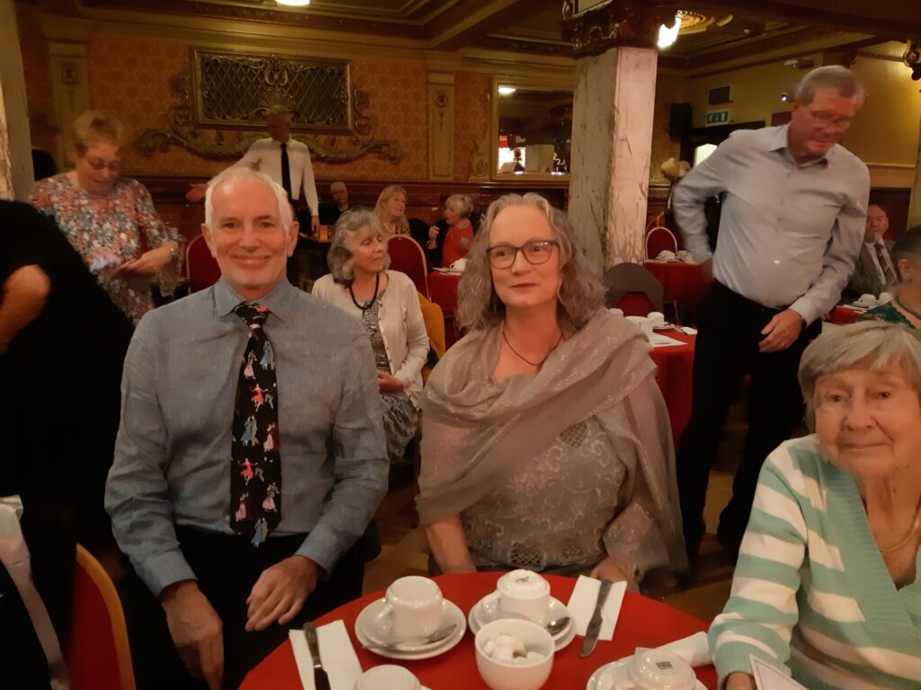 Members sitting at the table.