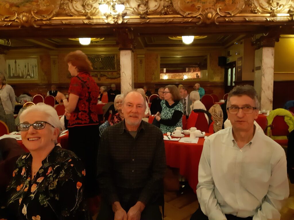 Members sitting at the table.