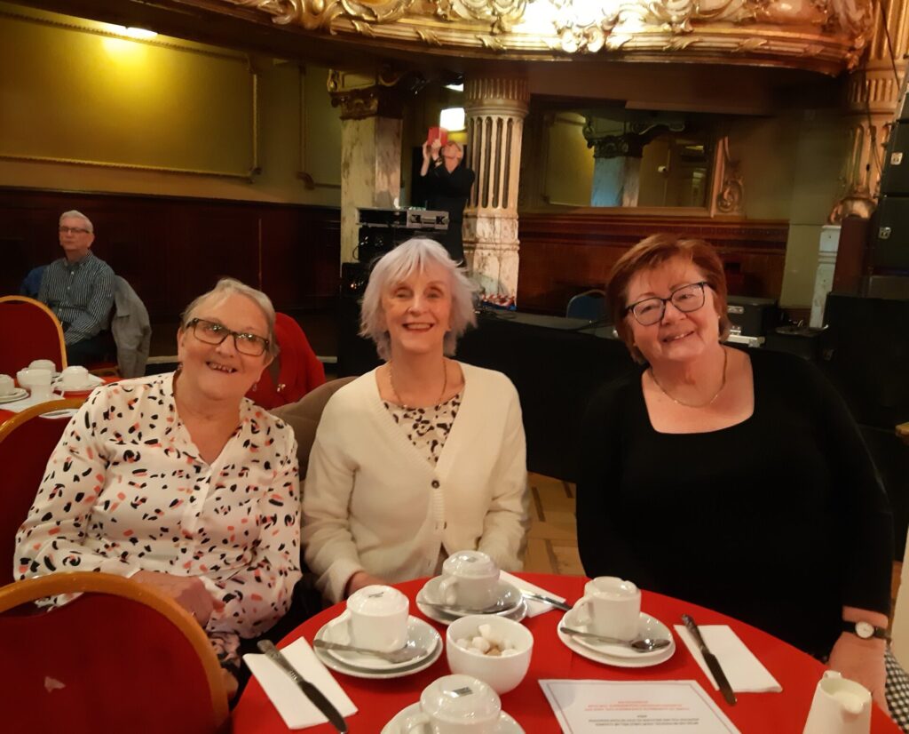 Members sitting at the table.