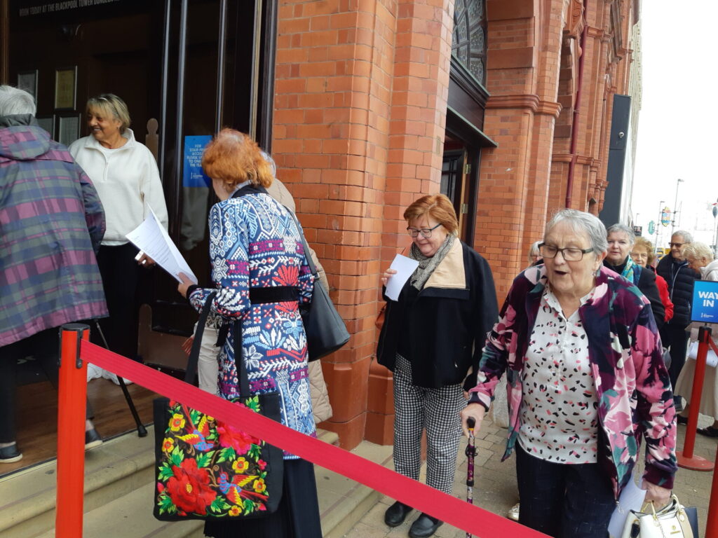 Members queuing to get in