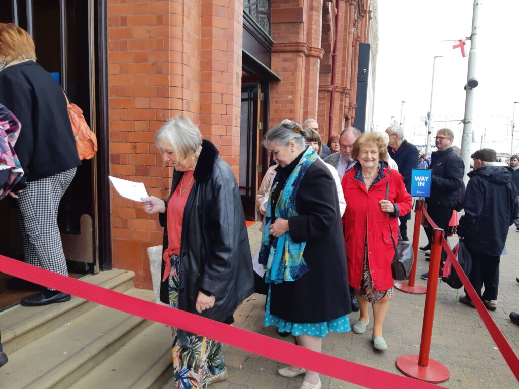 Members queuing to get in