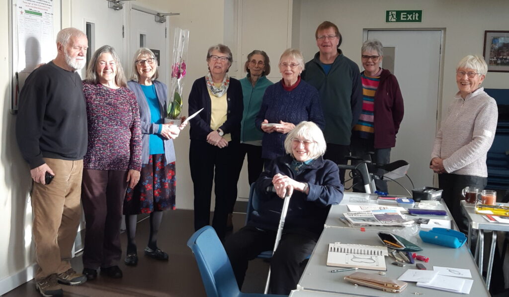 Members of the Drawing Group saying thank to the leader who is stepping down.