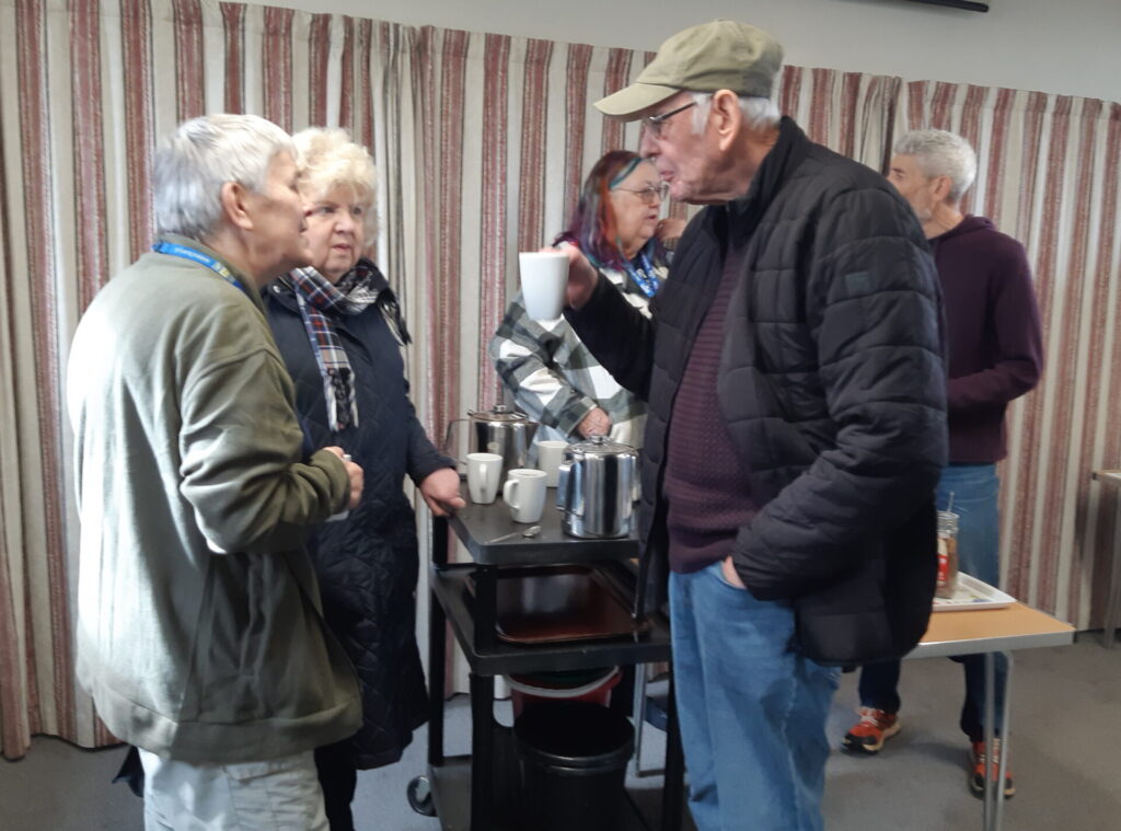 Standing round the tea table