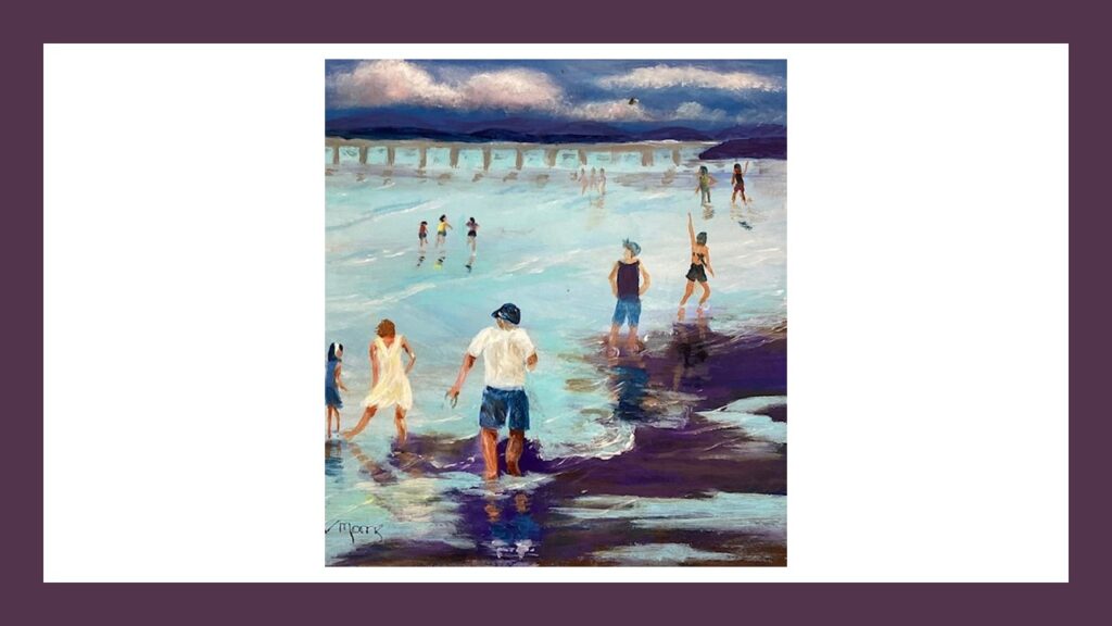 People in the river at Arnside, bridge in the background.