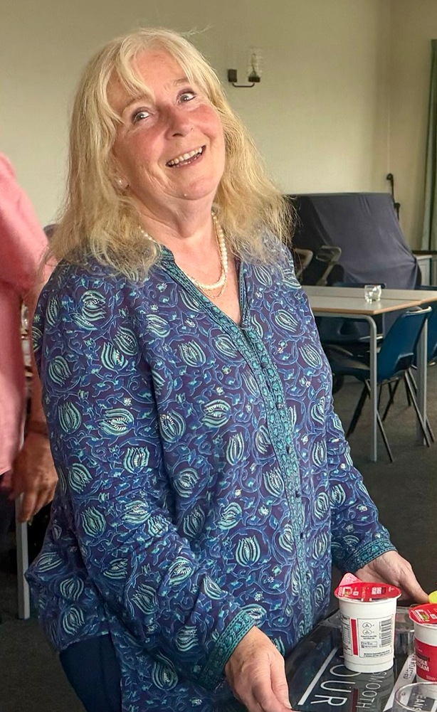 Sue with pots of cream