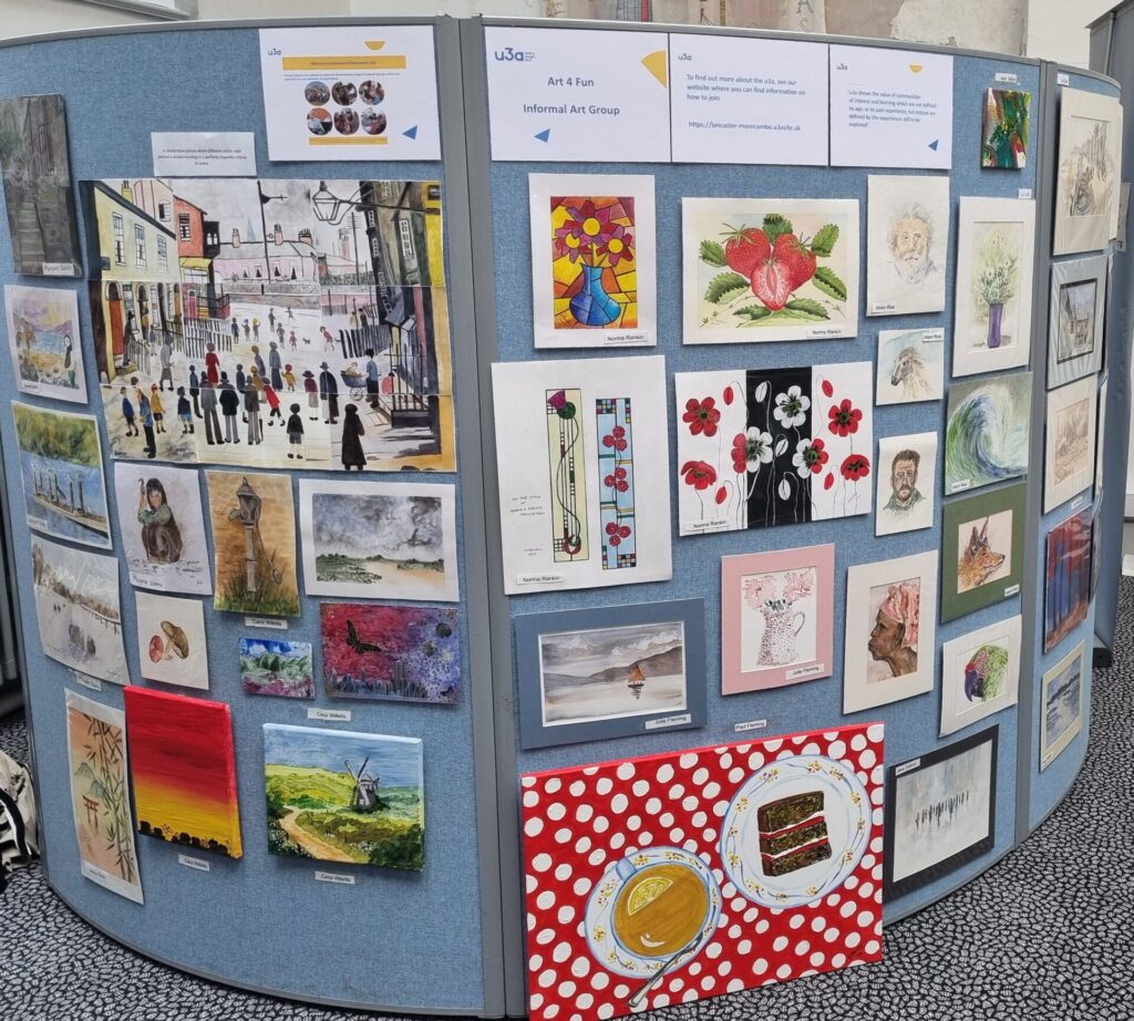 A selection of paintings by the Art4Fun group displayed in the library